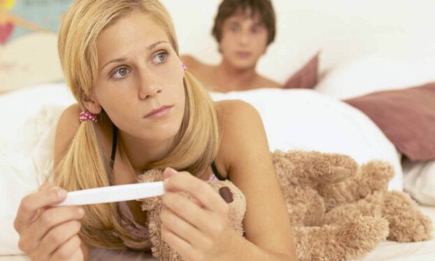 Girl with pregnancy test