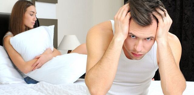 Men and woman in bed